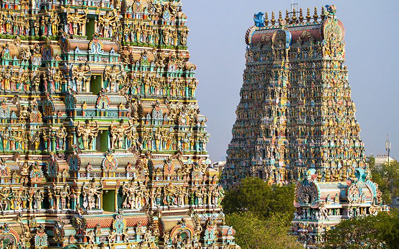 MADURAI, INDIA - MARCH 3: Meenakshi temple - one of the biggest and oldest Indian temples on March 3, 2013 in Madurai, Tamil Nadu, India. The 14 gateway towers called gopura ranging from 45 to 50m.